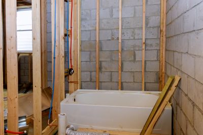 Contractor Installing Bathtub
